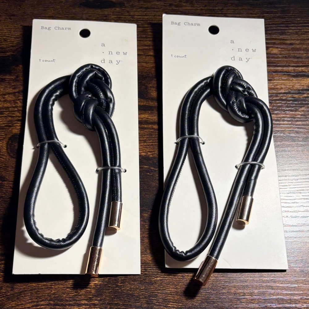 a new day Black Bag Charm Pair with Gold Tips